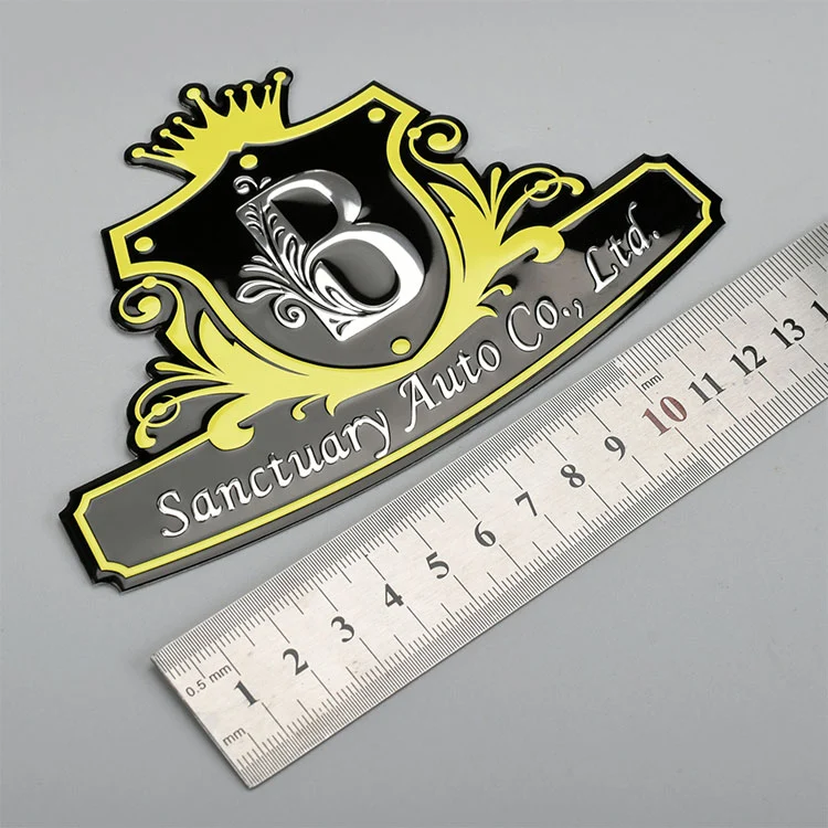 Metaletiket med logo