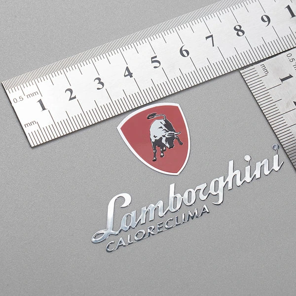 Nikkel skinnende varmebestandigt logo